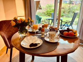 SommerLund - macht Laune auf Meer - Ruhige und sonnige Ferienwohnung mit Terrasse und Garten nahe Strand und Ostsee